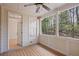 Cozy screened porch with wood floors, views of the backyard, and access to the home at 478 Vinings Estates Se Dr # B02, Smyrna, GA 30126