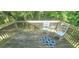 Open back deck featuring white chairs and outdoor rug at 728 Brittany Ct, Stone Mountain, GA 30083