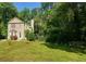 Attractive two-story home with well-manicured lawn, trees, and landscaping in a quiet, leafy neighborhood at 728 Brittany Ct, Stone Mountain, GA 30083
