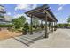 Well-maintained common area with beautiful pergola structure, lush landscaping, and plenty of shade at 2277 Peachtree Ne Rd # 701, Atlanta, GA 30309