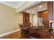 Modern kitchen with breakfast bar, dark granite countertops, and stainless steel appliances at 2277 Peachtree Ne Rd # 701, Atlanta, GA 30309