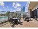 Spacious outdoor patio with dining tables, grill, and views of the community pool provides a relaxing experience at 2277 Peachtree Ne Rd # 701, Atlanta, GA 30309