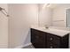 Chic bathroom features a modern vanity with marble countertop, and sleek fixtures at 1310 Kilmington Ct, Alpharetta, GA 30009
