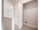 Cozy laundry room with washer/dryer hookups and plenty of storage space at 1310 Kilmington Ct, Alpharetta, GA 30009