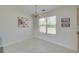 Cozy dining nook with a chandelier, large window, and view to outside, perfect for Gathering meals at 472 Linda Ln, Powder Springs, GA 30127