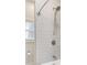 Modern bathroom with stylish tile shower, rainfall shower head, and sleek design at 953 Michigan Ave, Atlanta, GA 30314