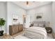 Comfortable bedroom featuring neutral colors, modern decor, and stylish wood-look flooring at 953 Michigan Ave, Atlanta, GA 30314