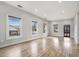 Spacious living room featuring wood floors and abundant natural light at 953 Michigan Ave, Atlanta, GA 30314