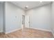 Open room with wood-look floors, fresh paint, and natural light at 953 Michigan Ave, Atlanta, GA 30314