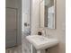 Bathroom featuring a single sink with chrome faucet and plank floors at 3345 Hillshire Dr, Cumming, GA 30028