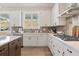 Well-equipped kitchen featuring custom cabinetry, modern appliances, and a functional layout for cooking at 3345 Hillshire Dr, Cumming, GA 30028