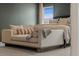Main bedroom sitting area with a chaise lounge in a well lit space at 3345 Hillshire Dr, Cumming, GA 30028