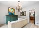Cozy living room with a modern chandelier, and stylish furnishings at 681 Braidwood Nw Ter, Acworth, GA 30101