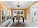 Well-lit home office with view, light hardwood floors, and built-in bookshelf at 681 Braidwood Nw Ter, Acworth, GA 30101