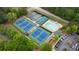 Aerial view of the community tennis and pickleball courts and swimming pool at 681 Braidwood Nw Ter, Acworth, GA 30101
