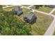 Aerial shot of a two-story house with a backyard deck and spacious lot at 8090 Tristan Way, Whitesburg, GA 30185
