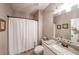 Cozy bathroom with shower/tub combo and granite vanity at 8090 Tristan Way, Whitesburg, GA 30185