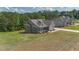 Beautiful two-story house with lush green lawn at 8090 Tristan Way, Whitesburg, GA 30185