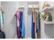 Organized closet with shelving and hanging space for clothes and accessories at 1954 Timothy Dr, Atlanta, GA 30329