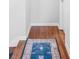 Hallway features hardwood floors and a decorative blue rug at 1954 Timothy Dr, Atlanta, GA 30329