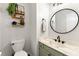 Elegant bathroom with marble countertops, modern fixtures, and decorative accents at 706 Briarleigh Sw Ct, Mableton, GA 30126