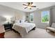Cozy bedroom with natural light and comfortable furnishings, creating a relaxing space at 706 Briarleigh Sw Ct, Mableton, GA 30126