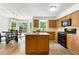 Well-appointed kitchen with granite countertops, center island, and a breakfast nook at 706 Briarleigh Sw Ct, Mableton, GA 30126
