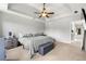 Spacious main bedroom with tray ceilings, fan and ensuite bathroom at 706 Briarleigh Sw Ct, Mableton, GA 30126