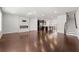 Spacious living room with hardwood floors and a modern fireplace extending to the open floor plan at 4325 Water Elm Aly, Doraville, GA 30360