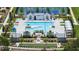 Aerial view of a beautiful pool area with cabanas, lounge chairs, and a bocce court at 301 Sobeck Way, Canton, GA 30115