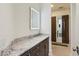 Stylish bathroom with marble countertop and dark wood cabinets at 2660 Peachtree Nw Rd # 4G, Atlanta, GA 30305