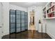 Inviting space features hardwood floors, built-in shelves, and unique decor at 2660 Peachtree Nw Rd # 4G, Atlanta, GA 30305