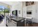 Bright, open kitchen with stainless appliances and views of the outside at 2660 Peachtree Nw Rd # 4G, Atlanta, GA 30305