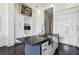 Modern kitchen featuring dark countertops, stainless steel sink, and white cabinetry at 2660 Peachtree Nw Rd # 4G, Atlanta, GA 30305