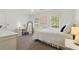 Cozy bedroom with carpet floors, plenty of natural light, and a modern aesthetic at 4979 Shadow Glen Ct, Dunwoody, GA 30338