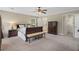 Relaxing main bedroom with lots of windows and sitting area that leads to attached bath and walk-in closet at 4979 Shadow Glen Ct, Dunwoody, GA 30338