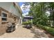 Relaxing backyard patio with a barbecue grill and outdoor seating area at 4979 Shadow Glen Ct, Dunwoody, GA 30338