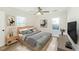 Comfortable bedroom with natural light, ceiling fan, and stylish furnishings at 1258 Lyle Ave, Atlanta, GA 30344