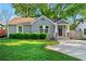 Charming one-story home with a well-manicured lawn and inviting front porch at 1258 Lyle Ave, Atlanta, GA 30344