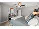 Comfortable bedroom with ceiling fan, gray walls, carpet, and gray bedspread at 357 Ridgewood Trl, Canton, GA 30115