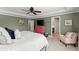 Spacious primary bedroom with en suite bathroom and plush carpet flooring at 357 Ridgewood Trl, Canton, GA 30115
