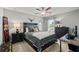 Relaxing bedroom featuring carpeted flooring, a ceiling fan, and natural light at 357 Ridgewood Trl, Canton, GA 30115