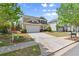 Attractive home featuring a two-car garage, lush lawn, and convenient driveway at 357 Ridgewood Trl, Canton, GA 30115