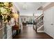 Elegant foyer with hardwood floors, staircase, and views into the living spaces at 357 Ridgewood Trl, Canton, GA 30115