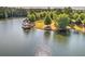 Scenic lake view featuring a gazebo and surrounding lush landscape at 357 Ridgewood Trl, Canton, GA 30115