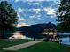 Scenic lake view featuring a charming gazebo on the water, perfect for relaxation and enjoying the tranquil surroundings at 357 Ridgewood Trl, Canton, GA 30115