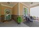 Welcoming porch area showcases comfortable seating and stylish stone accents at 357 Ridgewood Trl, Canton, GA 30115