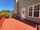 Inviting back deck is perfect for outdoor relaxation and entertaining, with access to the backyard at 4003 Preston Place Ln, Powder Springs, GA 30127