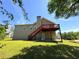 Large backyard featuring an expansive deck, ideal for outdoor living and relaxation space at 4003 Preston Place Ln, Powder Springs, GA 30127