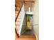 View of a well-maintained staircase with wood and white banisters at 4003 Preston Place Ln, Powder Springs, GA 30127